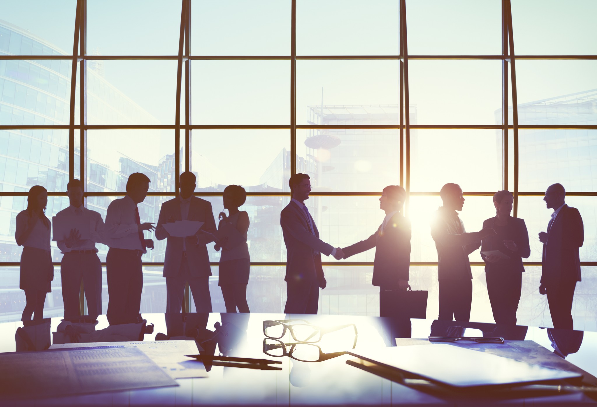 A Group of Business People Showing Respect for Each Other After a Meeting
